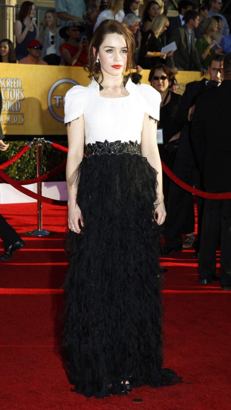 Actress Emilia Clarke poses on arrival at the 18th annual Screen Actors Guild Awards in Los Angeles, California 