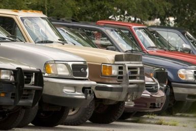 Used cars from the Cash-for-Clunkers program sit in the Ted Britt Ford dealership storage lot in Fairfax, Virginia