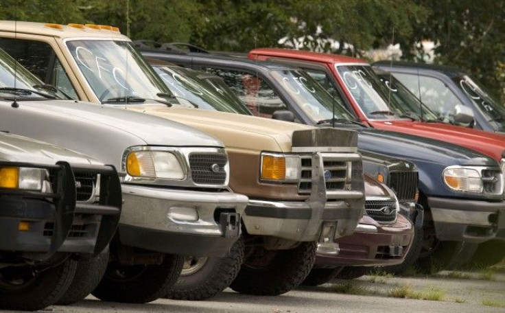 Used cars from the Cash-for-Clunkers program sit in the Ted Britt Ford dealership storage lot in Fairfax, Virginia