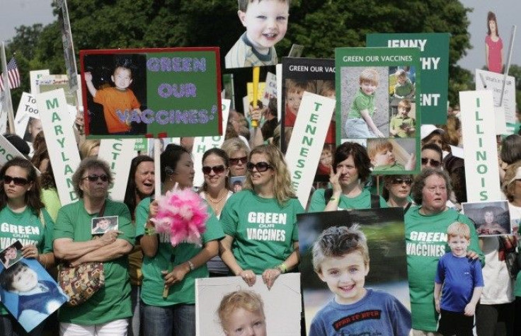 Families from across the U.S. living with autism take part in a rally calling to eliminate toxins from children's vaccines in Washington June 4, 2008.