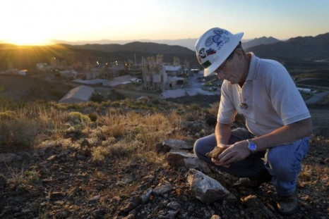 Brock O'Kelly, assistant general manager with Molycorp Minerals, surveys the property around the Mountain Pass Mine in Mountain Pass, California in this August 19 2009 photo