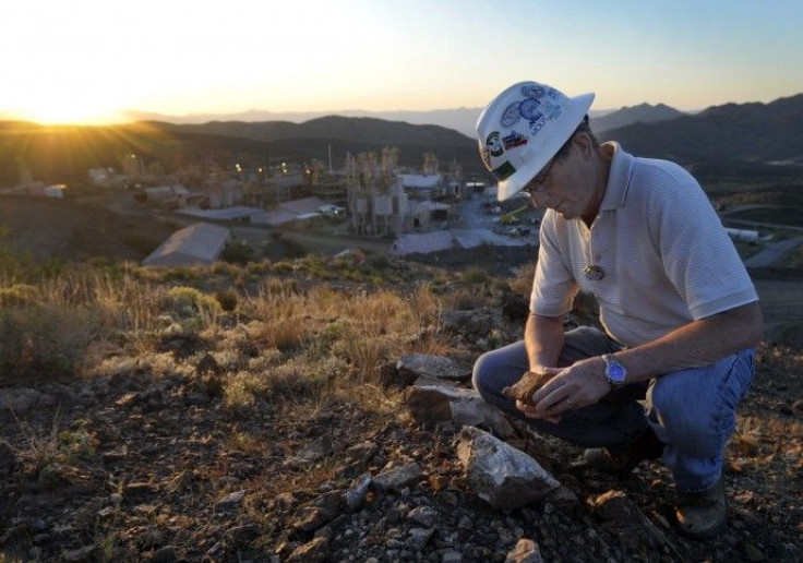 Brock O'Kelly, assistant general manager with Molycorp Minerals, surveys the property around the Mountain Pass Mine in Mountain Pass, California in this August 19 2009 photo