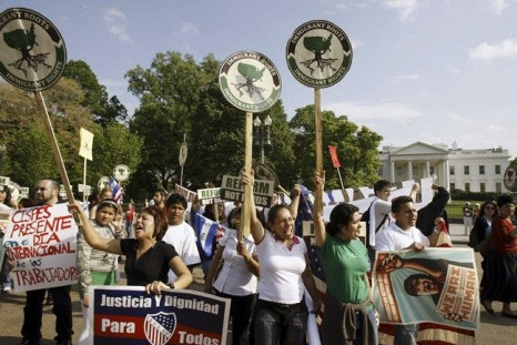 Latino demonstrators protest outside the White House during a May Day march in Washington, May 1, 2009. 