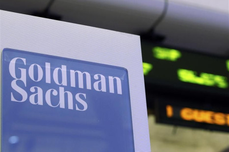 A Goldman Sachs sign is seen on at the company&#039;s post on the floor of the New York Stock Exchange