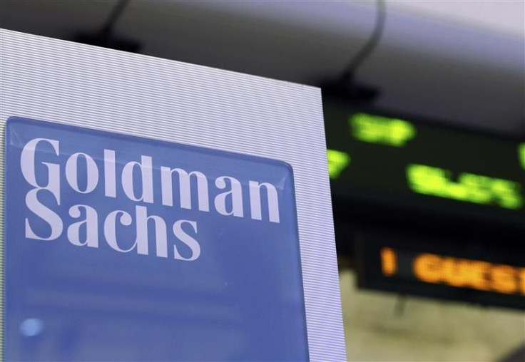 A Goldman Sachs sign is seen on at the company&#039;s post on the floor of the New York Stock Exchange