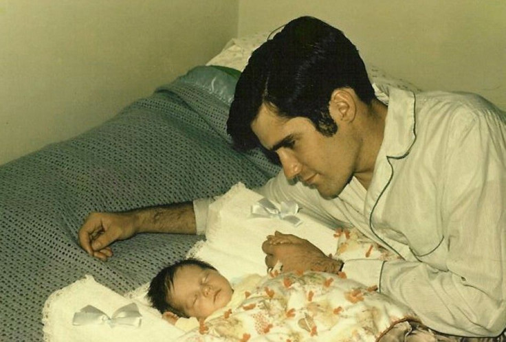 Mitt Romney and his son Tagg are seen in this 1970 handout photo from the Romney for President campaign, received by Reuters