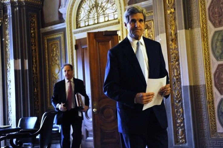 U.S. Senator John Kerry (D-MA) (Right) walks to the Senate floor during debate over ratification of the START treaty at the U.S. Capitol in Washington, December 22, 2010. 