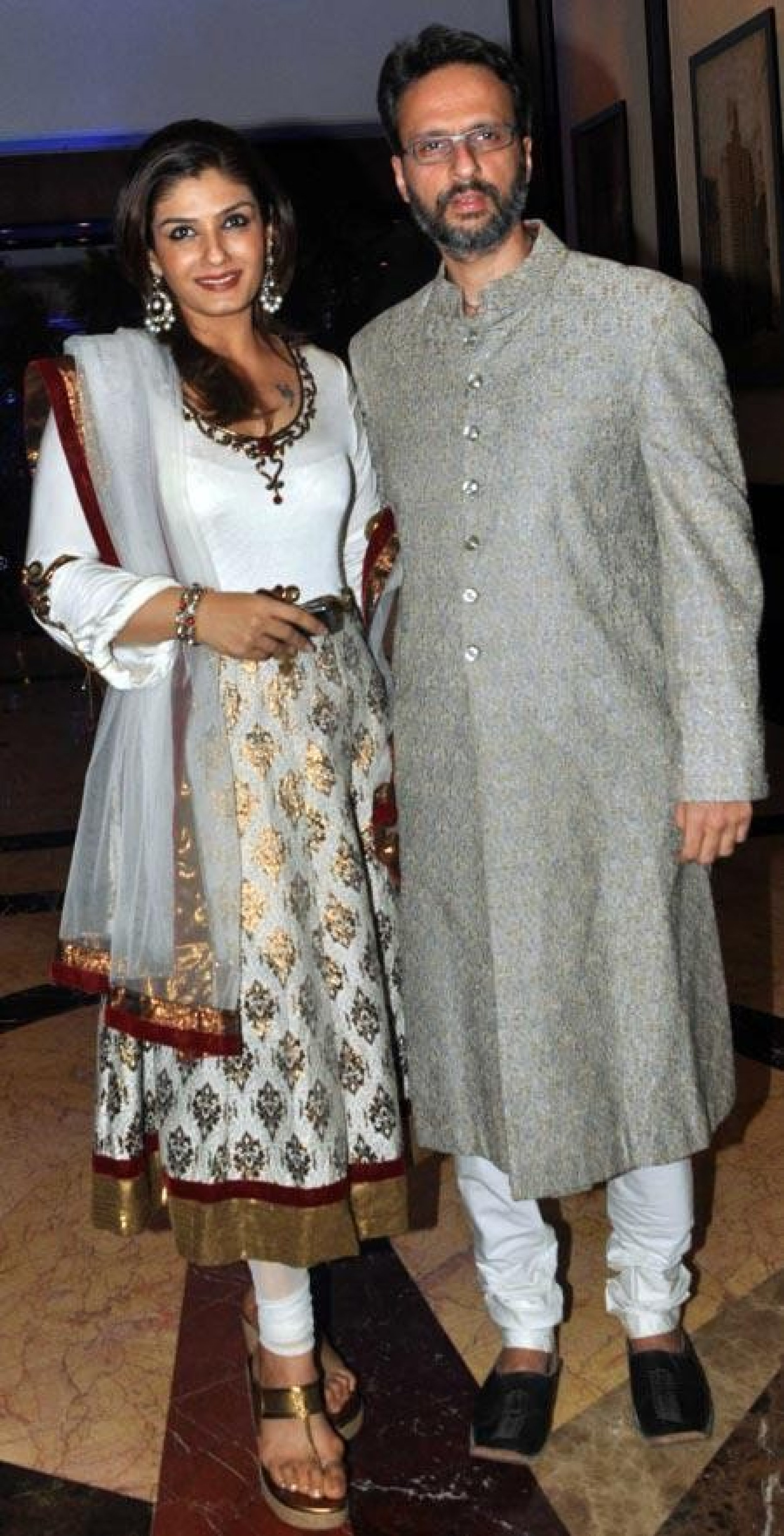 Bollywood actress Raveena Tondon with husband at Retiesh Deshmukh and Genelia DSouza039s wedding in Mumbai, India.