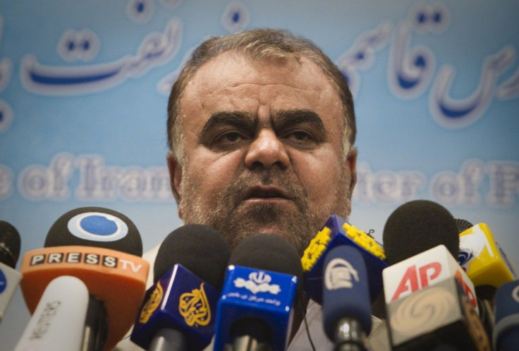 Iranian Oil Minister Rostam Qasemi talks to journalists during a news conference in Tehran on Saturday, Feb. 4, 2012