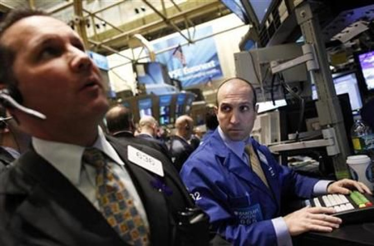 Traders work on the floor of the New York Stock Exchange