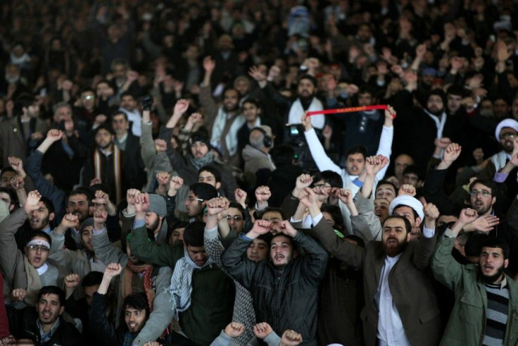 Worshippers shout slogans during Friday prayers at Tehran University February 3, 2012.