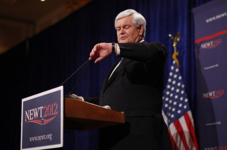 Republican U.S. presidential candidate Newt Gingrich looks at his watch as he speaks at a news conference on Saturday in Las Vegas after the Nevada caucuses in Las Vegas, Nevada, February 4, 2012.