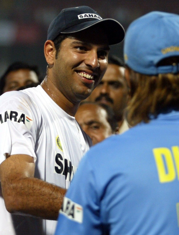 India&#039;s Yuraj Singh is congratulated by his team mate after selections as man of the series in Mumbai