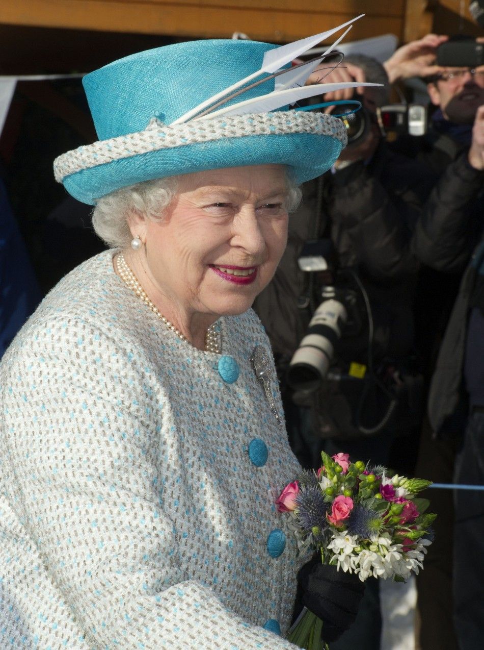 Britains Queen Elizabeth smiles during a visit to Dersingham Infant and Nursery School in Dersingham, eastern England