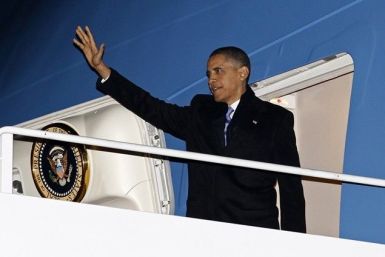 U.S. President Barack Obama boards Air Force One enroute to Hawaii for vacation December 22, 2010. 