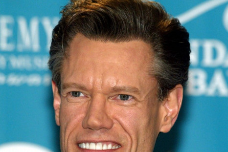 Country star Randy Travis smiles backstage at the 39th annual Academy of Country Music Awards at the..