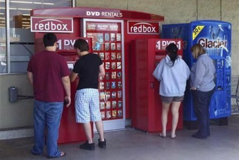 Customers rent DVD movies from a redbox video kiosk in Burbank, California, May 8, 2011.