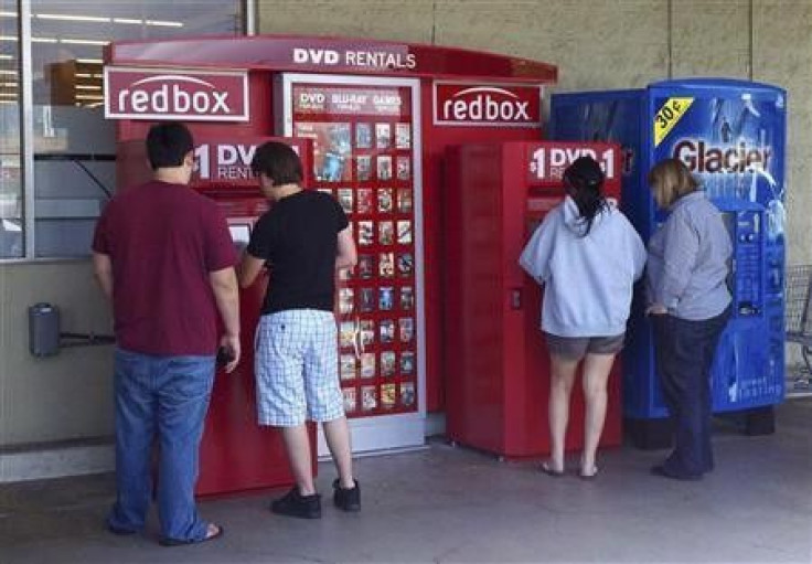 Customers rent DVD movies from a redbox video kiosk in Burbank, California, May 8, 2011.