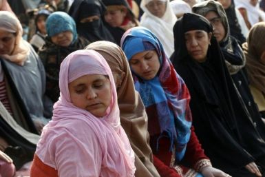 Kashmiri Muslim women offer prayers during the Eid al-Adha festival in Srinagar