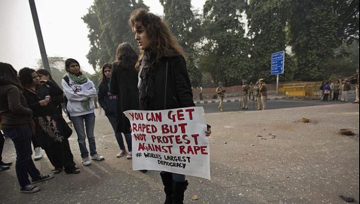 A demonstrator holds a placard as she takes part in a protest rally in New Delhi on Dec 27, 2012. India's external Affairs Minister Salman Khurshid, responding to a growing controversy over the move to send the 23-year-old gang rape victim to Singapore fo