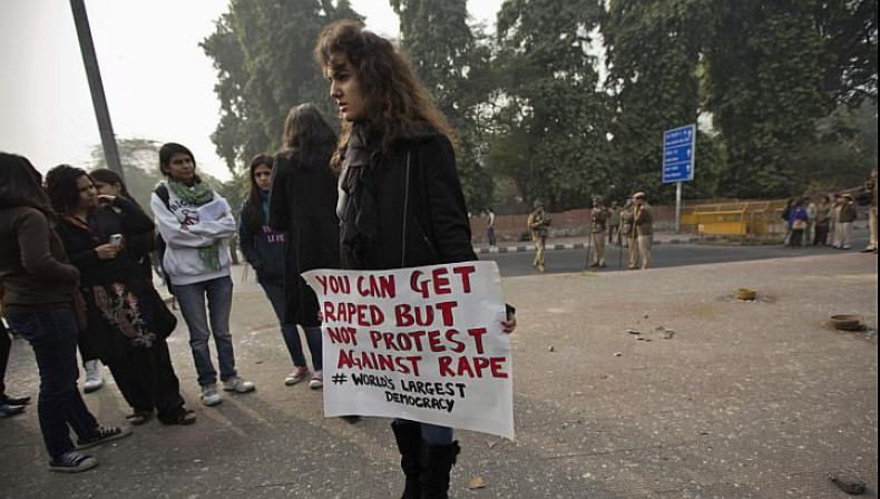 A demonstrator holds a placard as she takes part in a protest rally in New Delhi on Dec 27, 2012. India's external Affairs Minister Salman Khurshid, responding to a growing controversy over the move to send the 23-year-old gang rape victim to Singapore fo