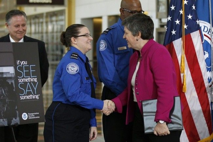U.S. Homeland Security Secretary Jan Napolitano greets TSA workers as she arrives to speak about heightened passenger vigilance and airport security at Reagan National Airport in Washington November 15, 2010. 
