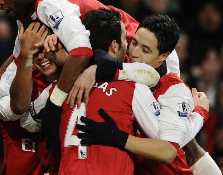 Arsenal's Cesc Fabregas celebrates his goal against Chelsea during their English Premier League soccer match in London.