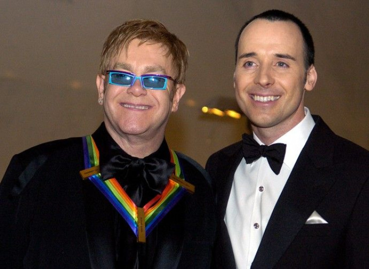 Sir Elton John becomes father.