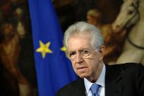 ItalianPM Monti looks on during a meeting with Secretary General of the Organization for Economic Cooperation and Development Angel Gurria at Chigi palace in Rome