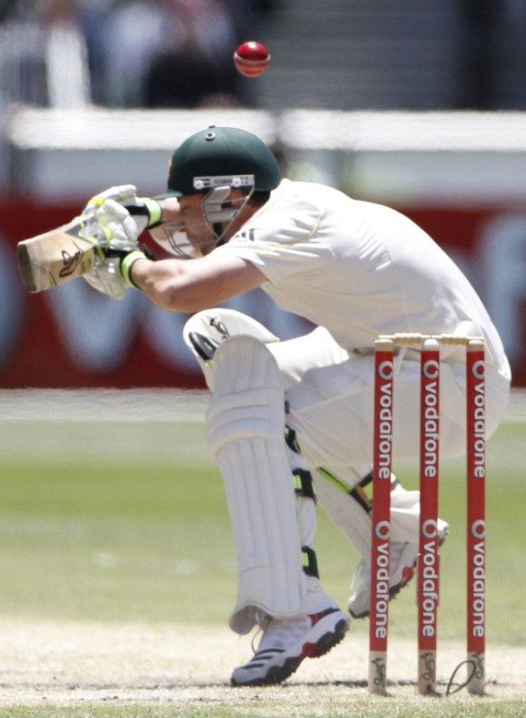 Australia's Hughes ducks under a bouncer during the third day of the fourth Ashes cricket test against England at the Melbourne Cricket Ground.