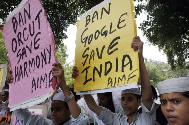 Dozens of Muslims protested against Google&#039;s Orkut site over some insulting words and cartoons of Prophet Mohammad and demanded the immediate banning of the site.