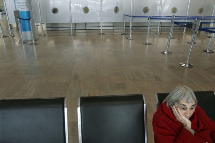 A lone traveller rests on a chair in Ben-Gurion international airport near Tel Aviv