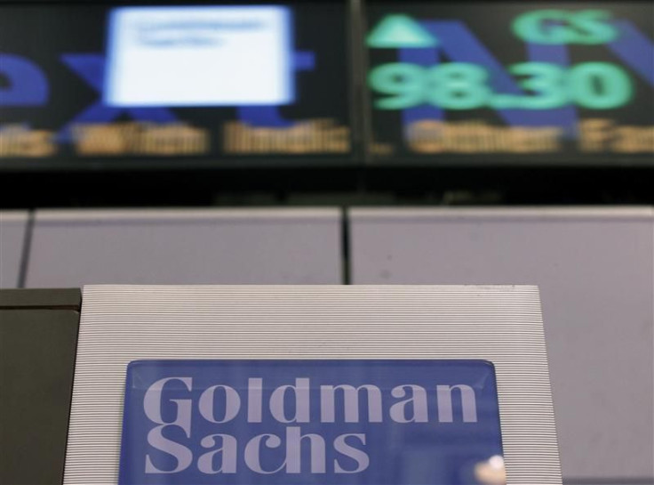 A Goldman Sachs sign is seen on at the company's post on the floor of the New York Stock Exchange