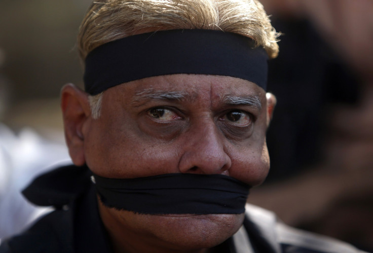 Demonstrator With Gags-Delhi Gang-Rape Victim-12.12.29