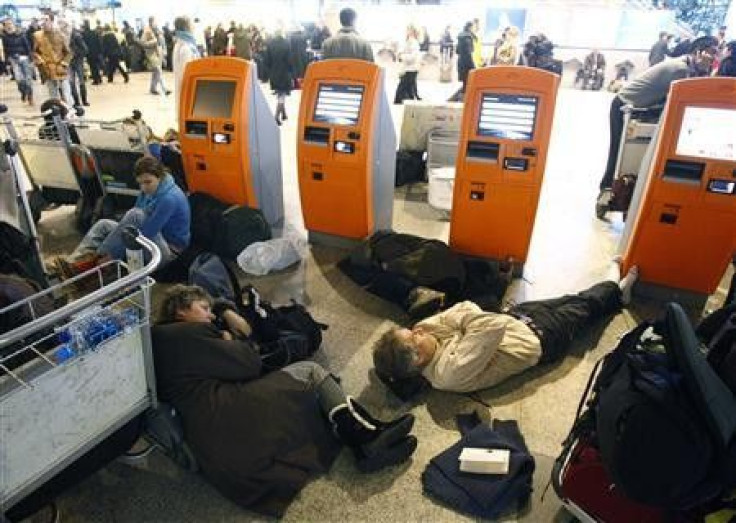 Passengers sleep at the departure hall of Moscow's Domodedovo airport 
