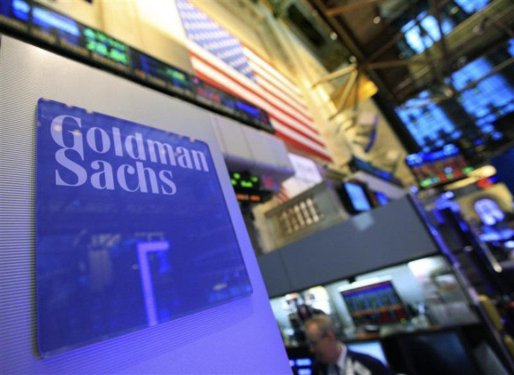 A Goldman Sachs sign is seen on at the company&#039;s post on the floor of the New York Stock Exchange