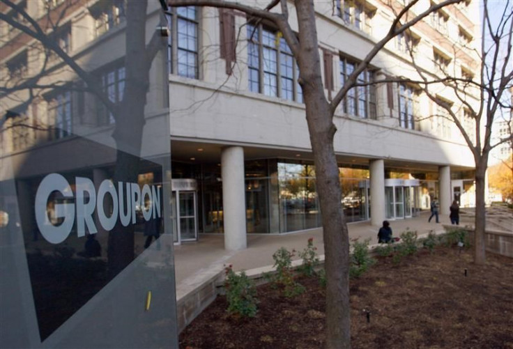 People enter and leave Groupon Inc corporate office and headquarters in Chicago