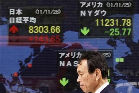 Nikkei falls from 3-month high but still above 9,000