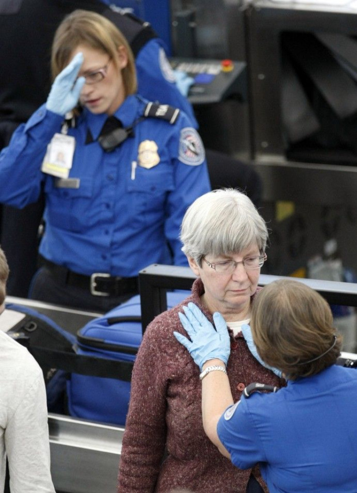 A Transportation Security Administration worker during a patdown search