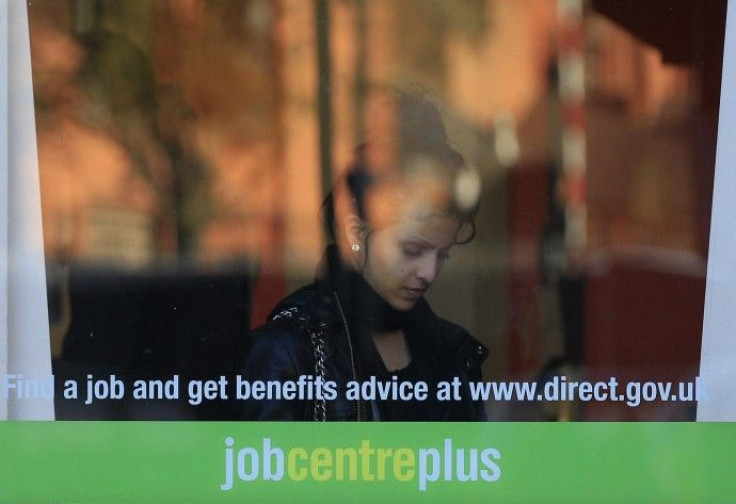 A woman enters an employment centre in Leicester, central England
