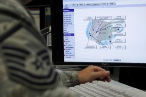 A map is displayed on one of the screens at the Air Force Space Command Network Operations & Security Center at Peterson Air Force Base in Colorado Springs