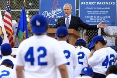 Los Angeles Dodgers owner Frank McCourt speaks during the unveiling of a new Dodgers baseball field for children in Compton, Los Angeles, California