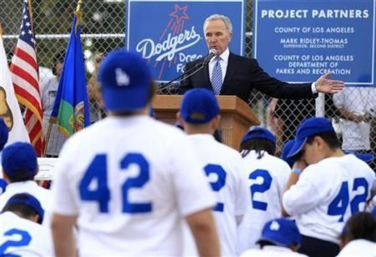 Los Angeles Dodgers owner Frank McCourt speaks during the unveiling of a new Dodgers baseball field for children in Compton, Los Angeles, California