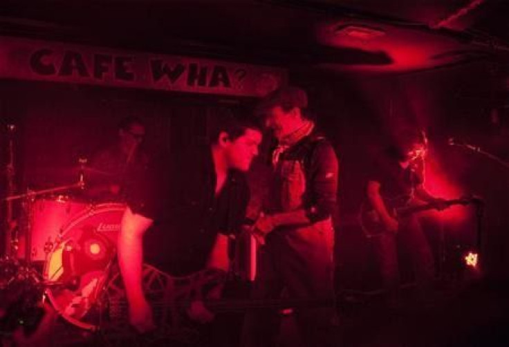 Singer David Lee Roth (2nd R) performs with (L-R) Alex, Wolfgang, and Eddie Van Halen during a private Valen Halen show to announce the band&#039;s upcoming tour at Cafe Wha? in New York