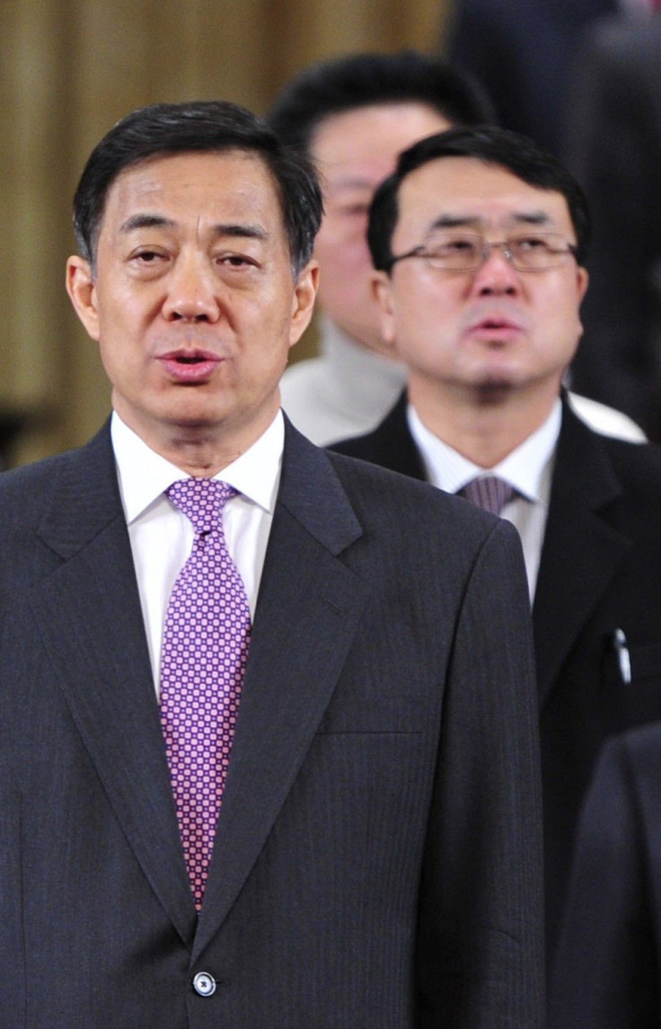 China&#039;s Chongqing Municipality Communist Party Secretary Bo and Deputy Mayor of Chongqing Wang sing national anthem during session of the CPPCC of the Chongqing Municipal Committee