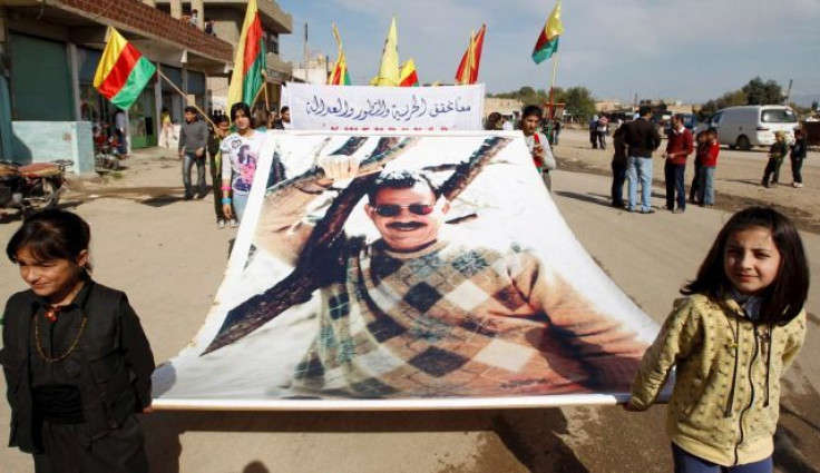 Kurdish carry banner of Ocalan