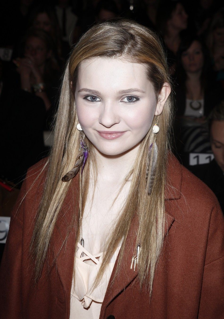Actress Abigail Breslin arrives for the Rebecca Minkoff FallWinter 2012 collection show during New York Fashion Week February 10, 2012. 