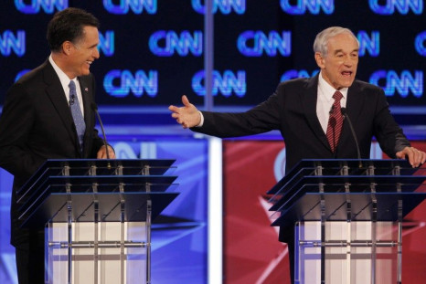 Republican presidential candidate U.S Representative Ron Paul (R-TX)  and former Massachusetts Governor Mitt Romney (L) 