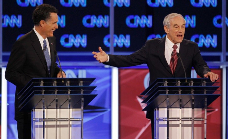 Republican presidential candidate U.S Representative Ron Paul (R-TX)  and former Massachusetts Governor Mitt Romney (L) 