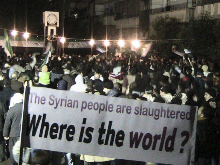 Demonstrators gather during a protest against Syria&#039;s President Bashar al-Assad in Homs February 10, 2012.